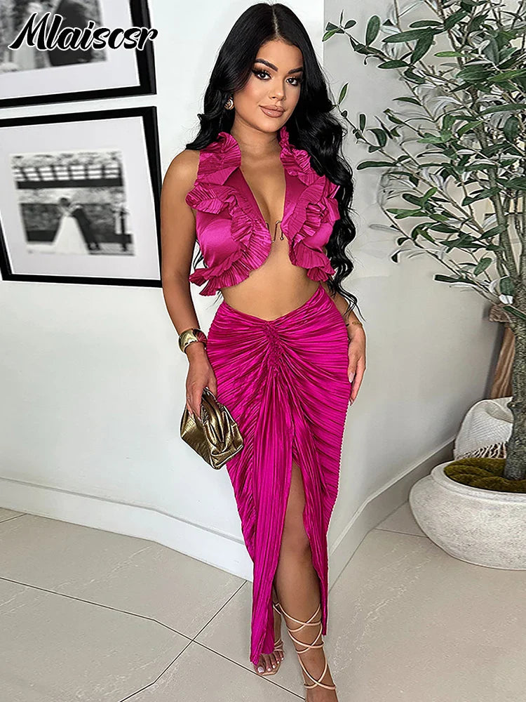 Stylish black crop top from Mlaiscsr with a v-neck design, perfect for sophisticated evening wear.