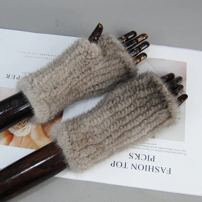 Stylish half finger mink fur gloves for women, showcasing a chic design that provides both comfort and sophistication.