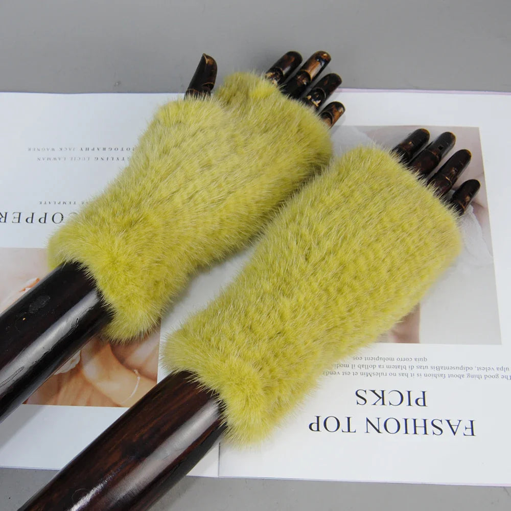 Luxurious women's gloves in solid mink fur, featuring a wrist-length cut for enhanced comfort while typing.