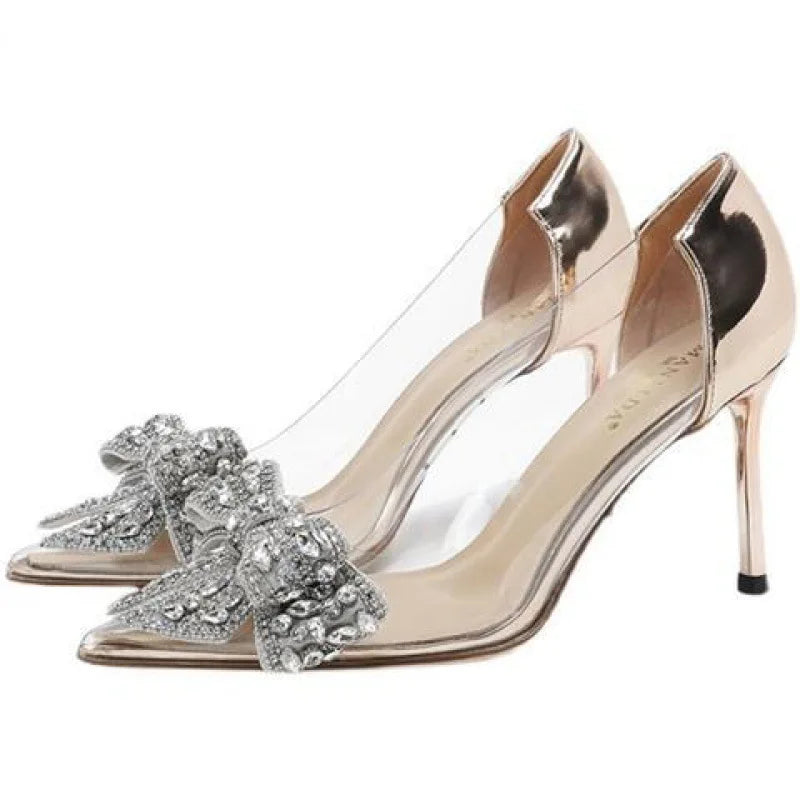 Fashion-forward transparent high heels sandals for women, featuring a subtle yet luxurious rhinestone embellishment for a glamorous touch.
