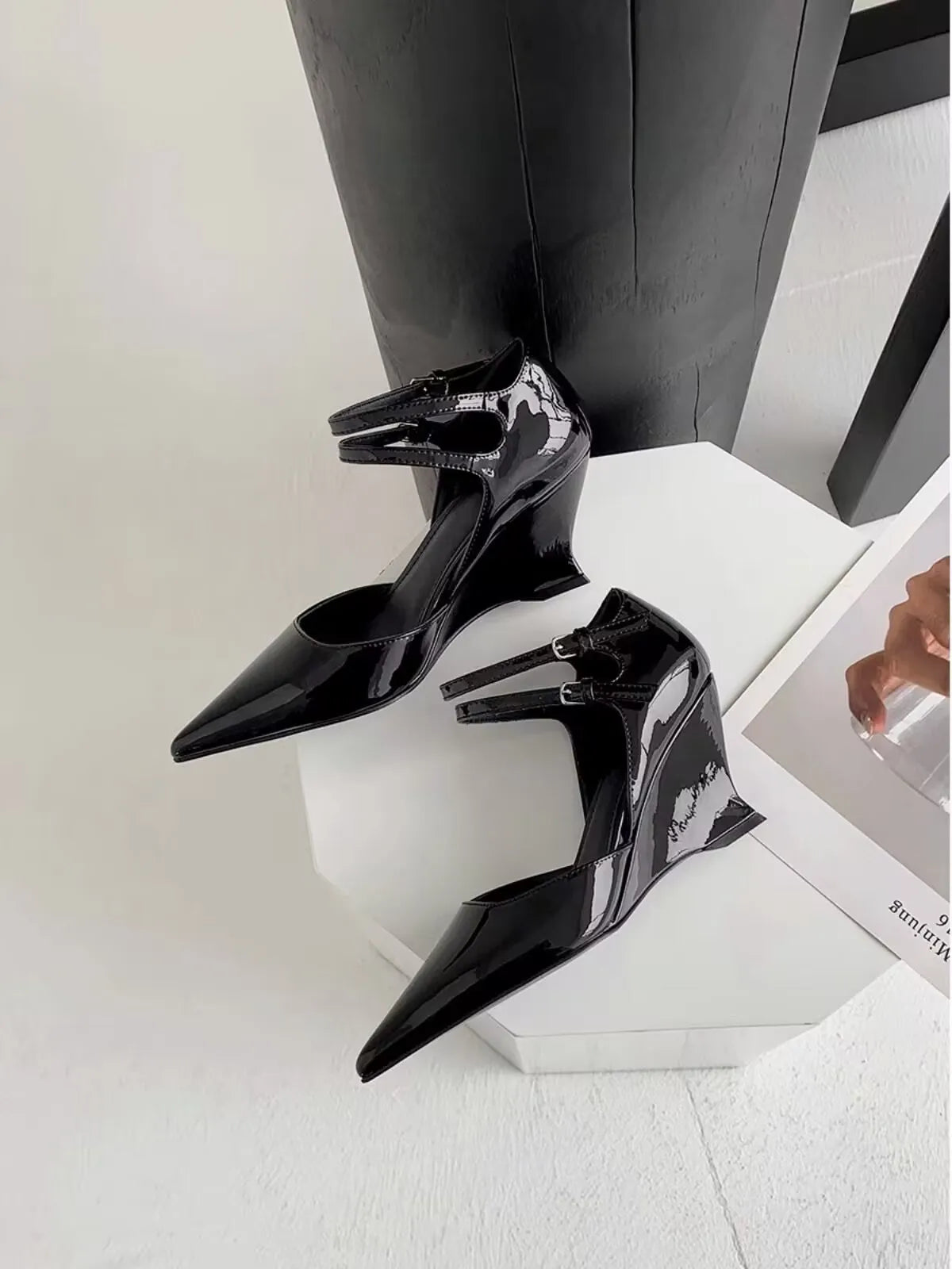 Exquisite women's high heel wedge sandals featuring a stylish pointed toe design and elegant buckle closure, perfect for spring fashion.