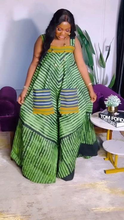 Fashionable CM.YAYA Women’s Wide Leg Jumpsuit featuring practical pockets, blending comfort and sophistication for upscale outings.