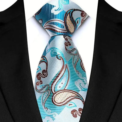 Stylish neck tie featuring intricate floral jacquard weaving in green and blue plaid, ideal for the modern gentleman.