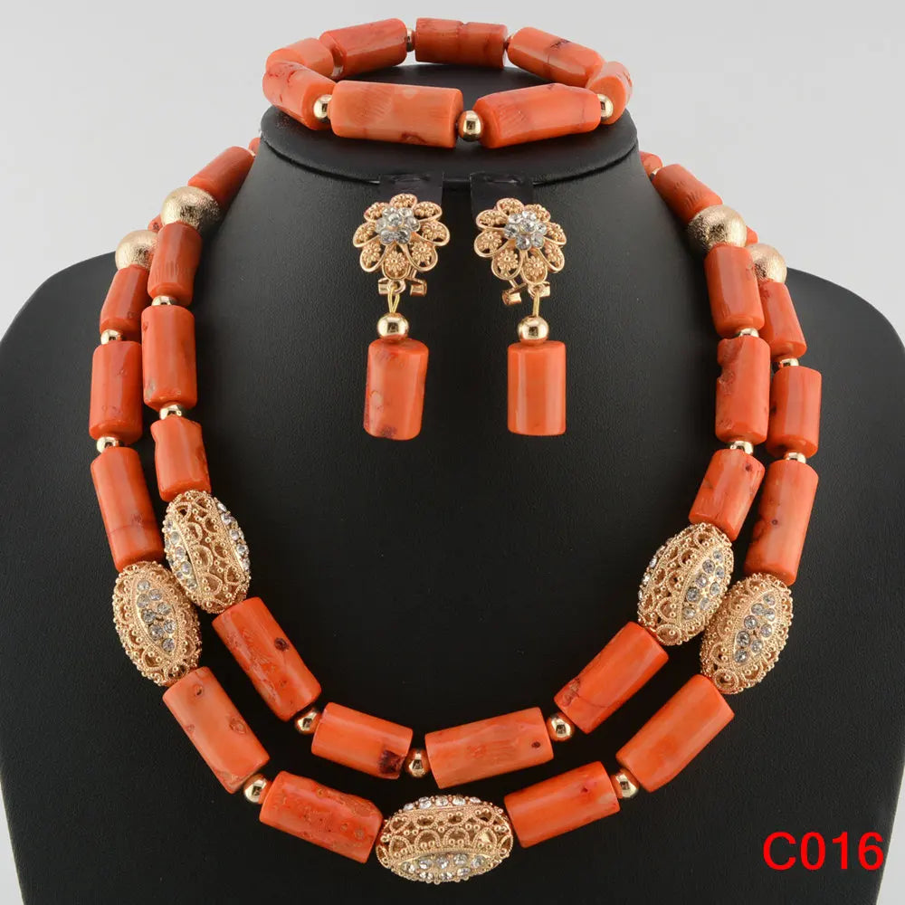 Stunning visual of complete luxury coral bead jewellery set, including necklace, earrings, and bracelet, designed for sophisticated wearers.