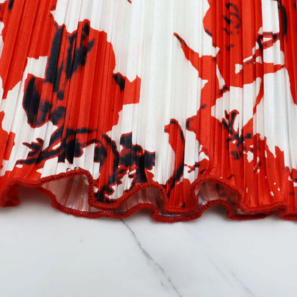 Sophisticated and vibrant women's tie dye dress, showing off a flattering ankle-length cut, perfect for summer vacations.