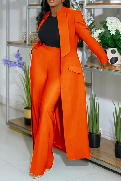 Stylish ensemble of full sleeve blazer and wide leg pants, designed for the modern woman, radiating confidence and grace in an upscale office environment.