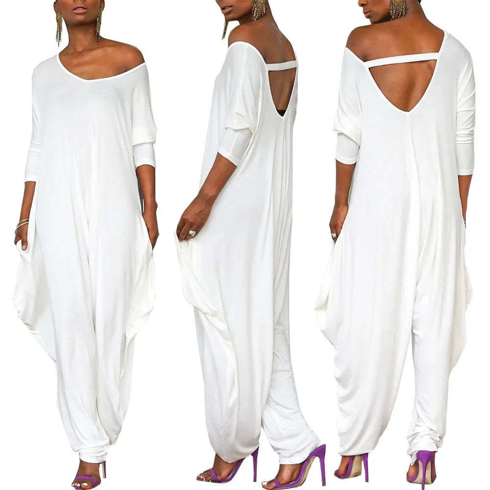 Chic solid colour wide leg jumpsuit showcasing a contemporary skew collar and tailored loose fit, ideal for high street fashion enthusiasts.