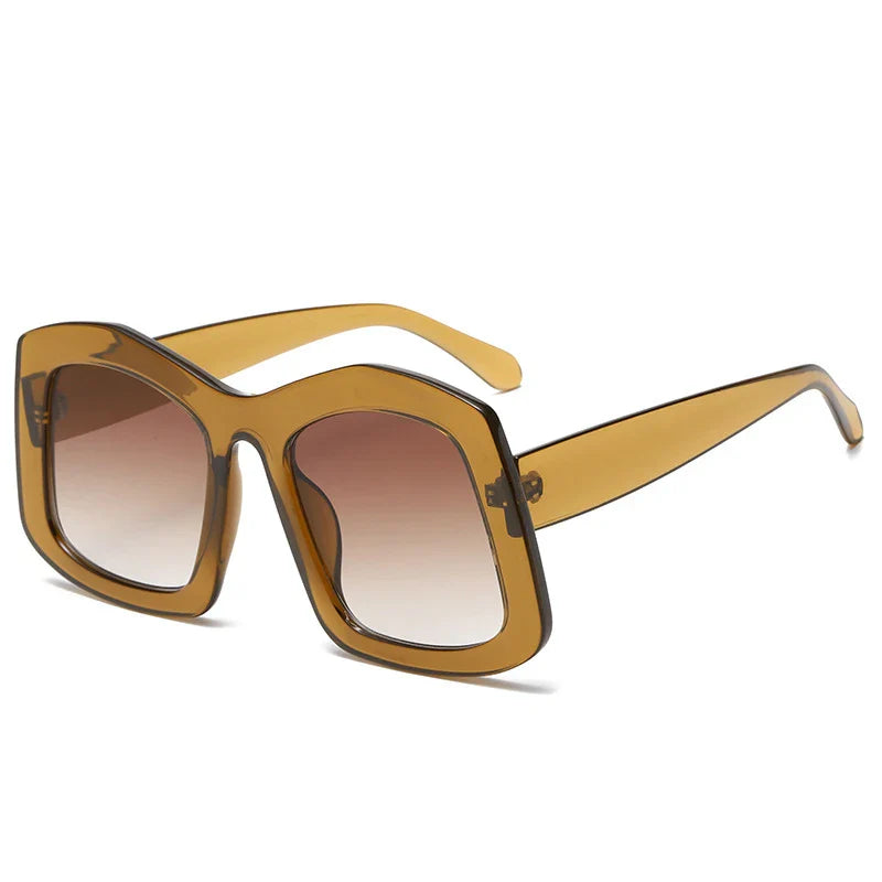 Stylish women's gradient orange oversized sunglasses, offering UV400 protection, made from premium polycarbonate for a luxurious look.