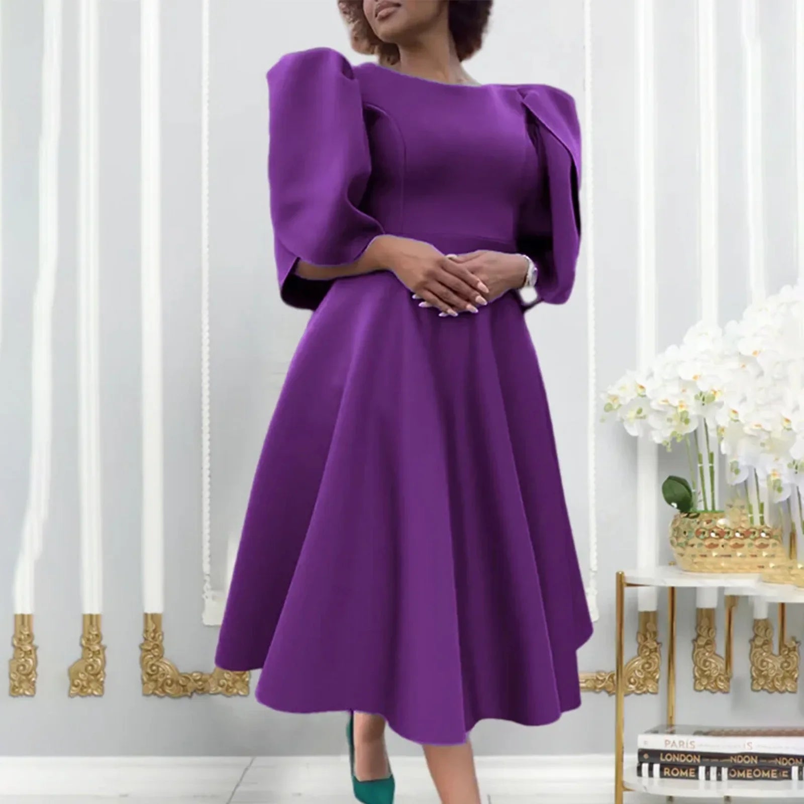 Chic and luxurious pleated dress for women, featuring half sleeves and a comfortable fit, suitable for all seasons and stylish events.