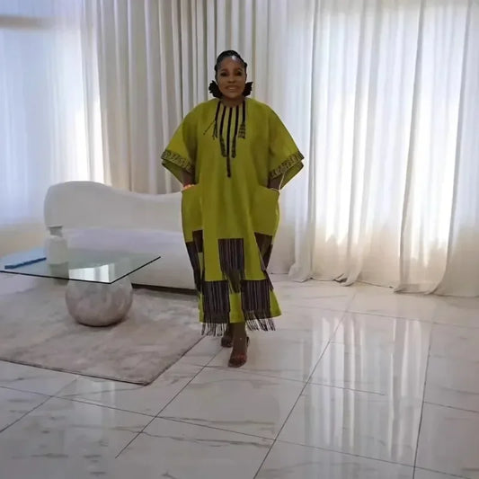 Luxury Plus Size African Dashiki Dress in vibrant orange-red and apricot colours, featuring a fashionable half sleeve O-neck design crafted from high-quality polyester, ideal for women seeking elegant traditional clothing.