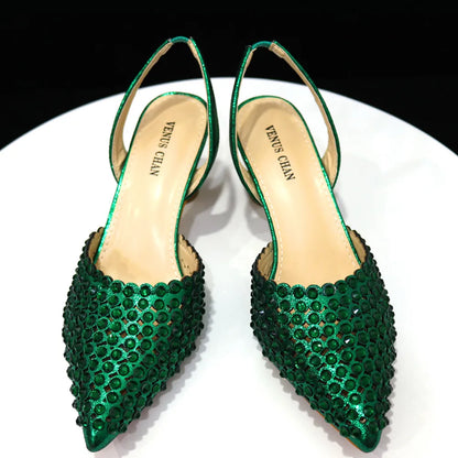 High heel shoe and handbag set by Venus Chan, featuring rich green hues and striking pointed toe, perfect for parties and special occasions.