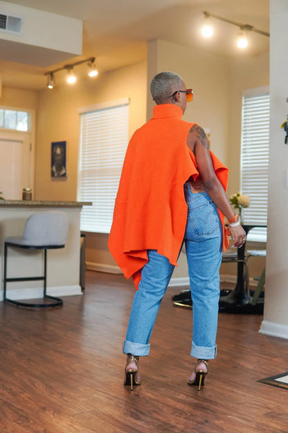 Model showcasing CM.YAYA Women's One Sleeve Turtleneck Sweater, combining luxury and comfort in a stunning streetwear winter look.