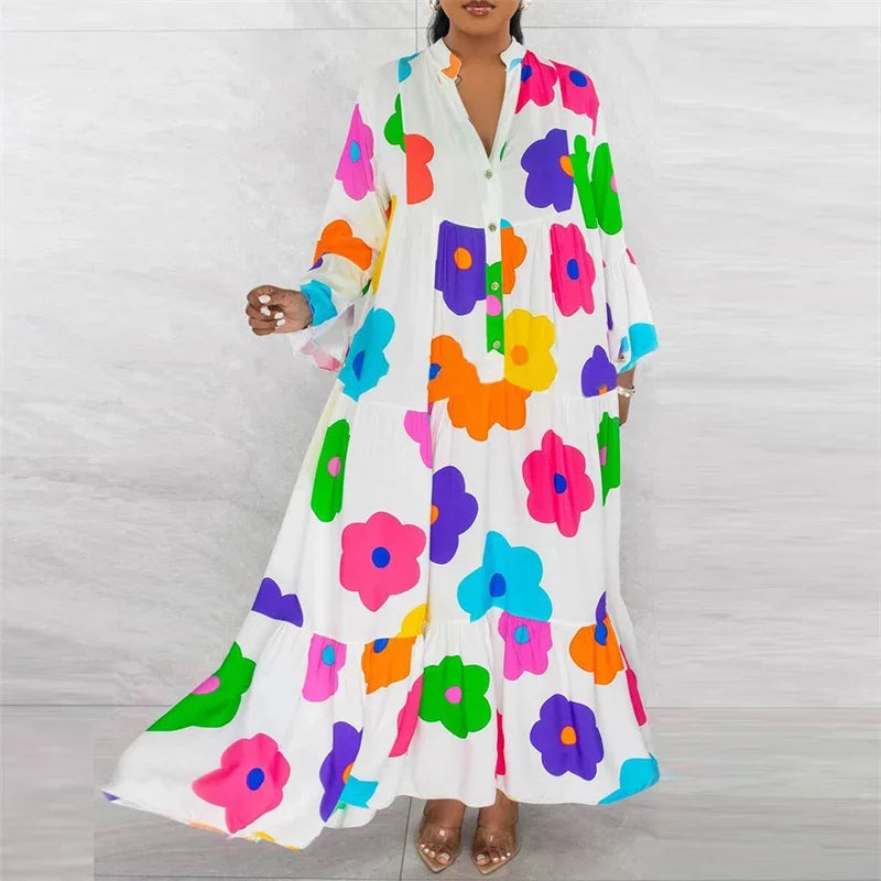 The graceful silhouette of a women's long sleeve floral shirt dress, draping elegantly with a loose fit and V-neckline, ideal for both casual and party wear.