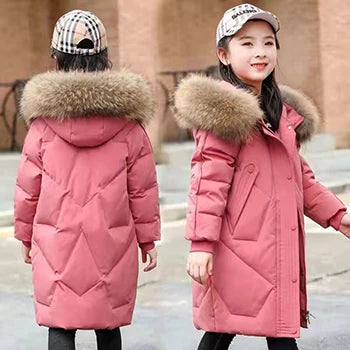 Chic and fashionable girls parka in rich colours, showcasing a luxurious fur collar, ideal for winter outings and essential for ages 5-14.