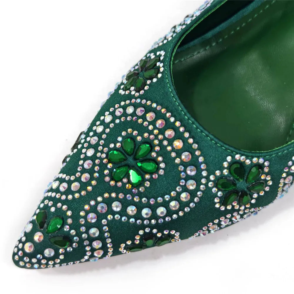 Elegant fuchsia high heels with rhinestone toe detail, showcasing a luxurious design for women's fashion pumps.