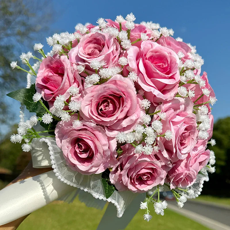 Beautifully arranged silk wedding bouquet with babysbreath roses and stunning pearl lace, ideal for bridal elegance.