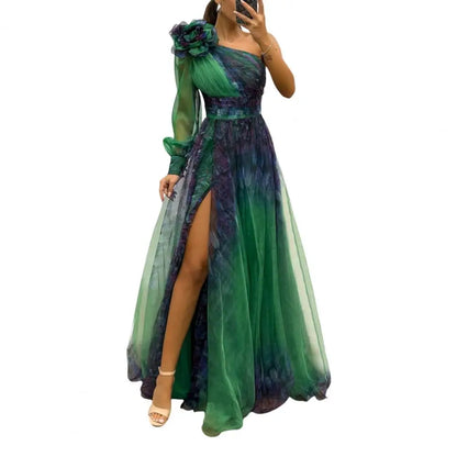 Trendy long sleeve evening dress for women, designed in soft chiffon with a one shoulder and pleated A-Line style, epitomizing luxury and style.