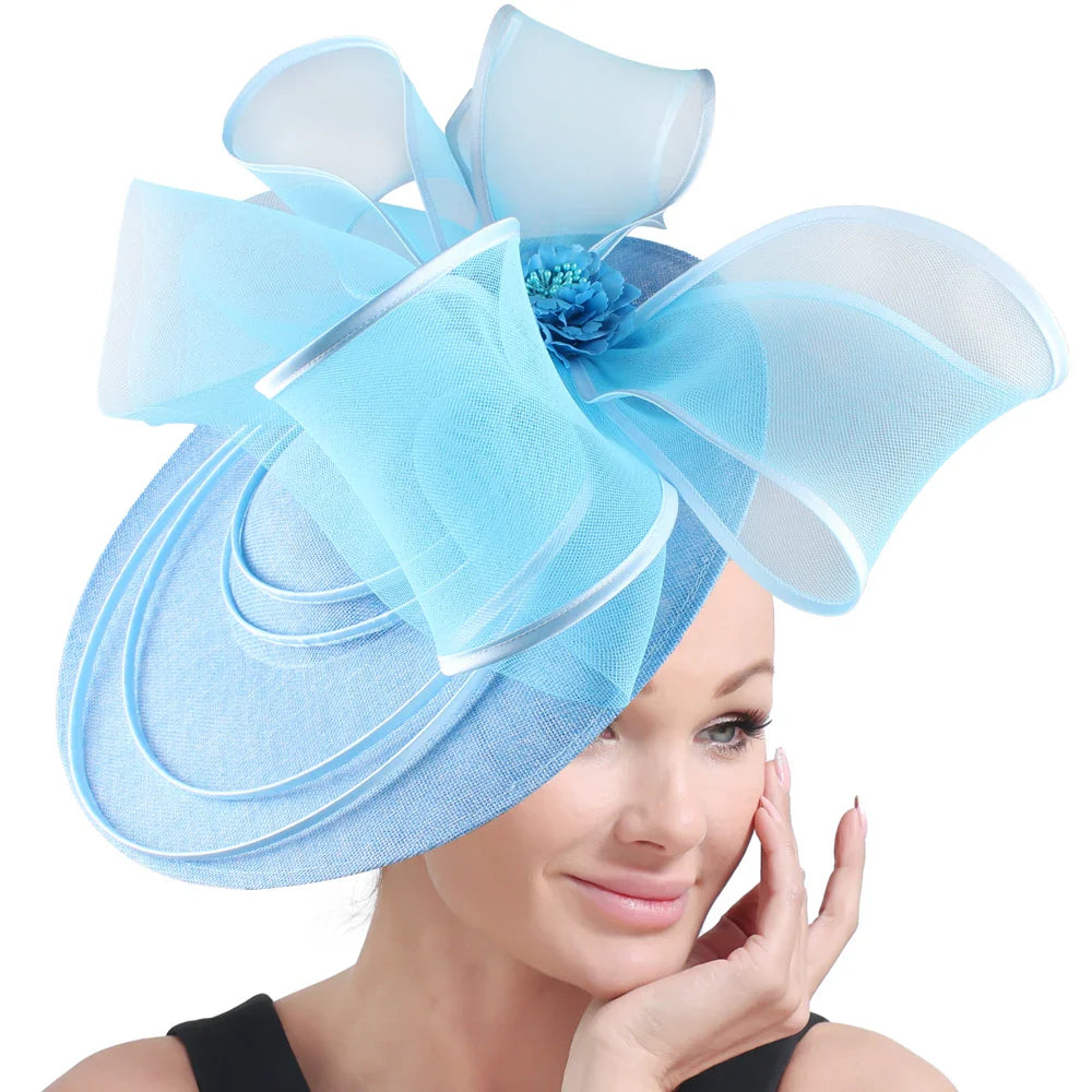 Chic floral fascinator hat for women, adding a touch of elegance to any cocktail, church, or party attire.