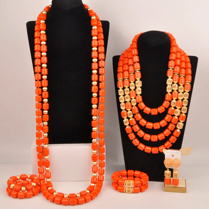 Complete Nigerian bridal jewelry set displayed elegantly, featuring a necklace, bracelet, and earrings with rich artificial coral beads.