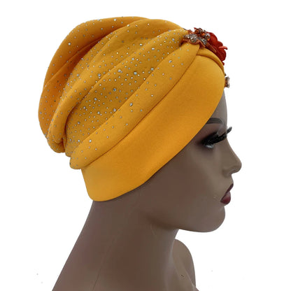 African turban cap displayed on a model, exhibiting a chic and elegant style, ideal for all-season fashion.