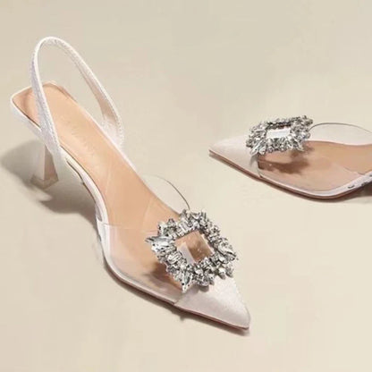 BCEBYL Women’s high heels with glamorous crystal embellishments, presented against a chic backdrop, perfect for luxurious party occasions.
