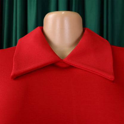 Model wearing a stunning high-waisted pleated dress, highlighting the stylish silhouette and sophisticated Peter Pan collar.