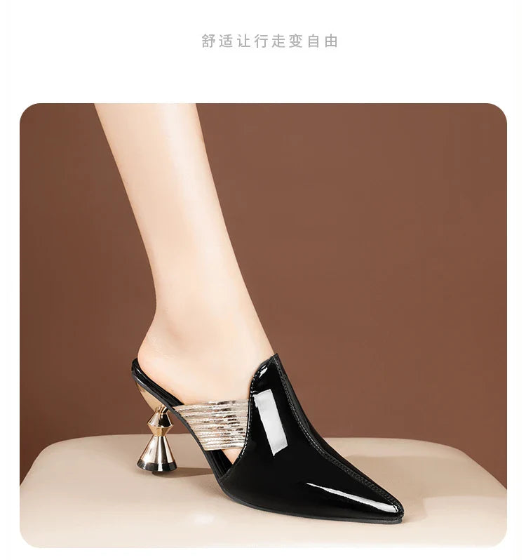 Elegant black high heel slippers for women featuring pointed toe design and luxurious metal heel, perfect for summer outings.