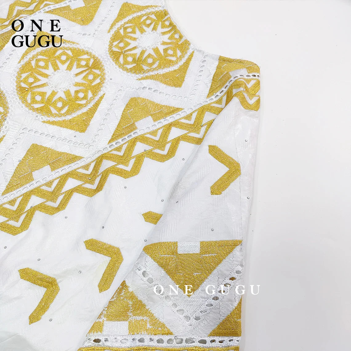 Stylish embroidered gown featuring luxurious gold accents and fine lace detailing, designed for women who appreciate premium quality African clothing.