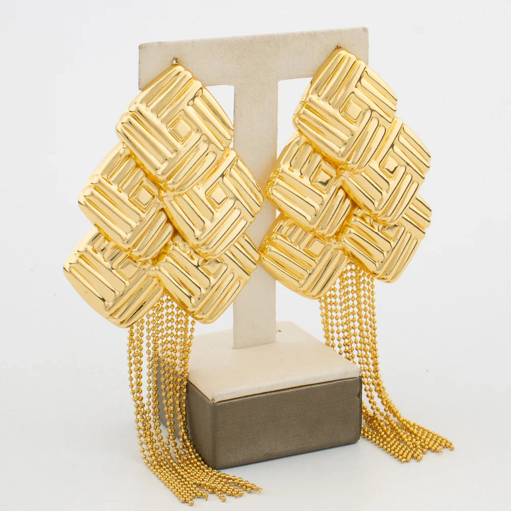 Luxury Bohemian gold color tassel drop earrings designed for women, embodying ethnic style perfect for weddings and parties.