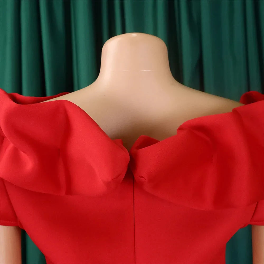 Close-up view of the ruffle detailing on an off shoulder mermaid dress, showcasing exquisite craftsmanship and a sexy silhouette for women's evening wear.