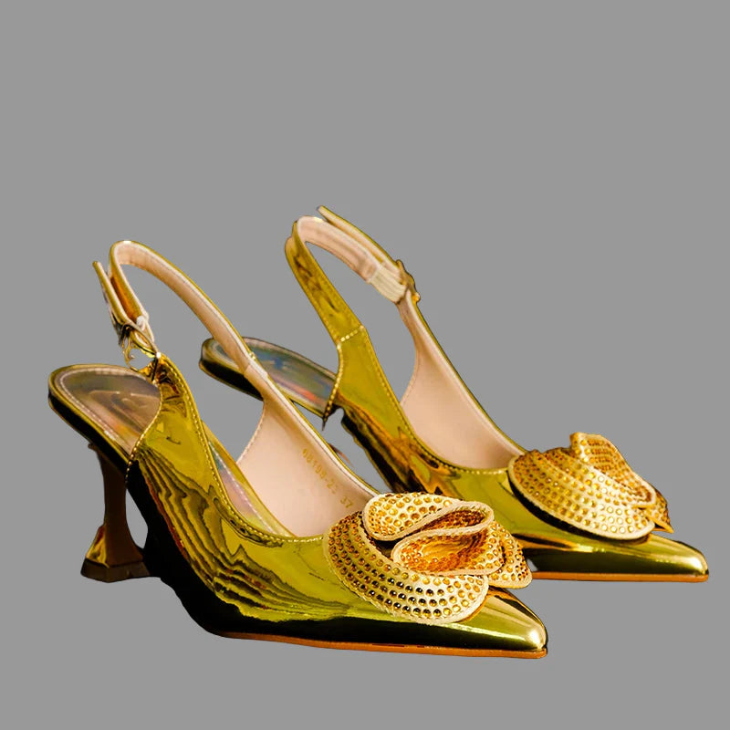 Detailed view of high heel ankle strap pumps in gold, showcasing premium materials and exquisite craftsmanship for special occasions.