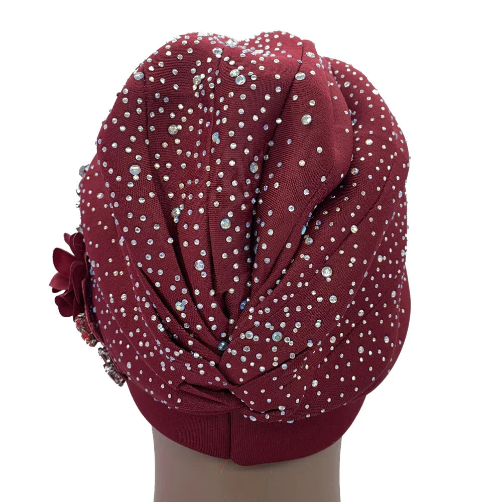 Beautifully designed African turban cap combining traditional style with contemporary rhinestone decor, suitable for all seasons.