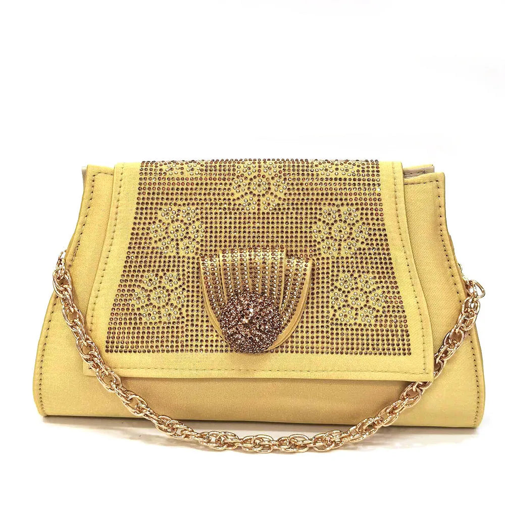 Sophisticated Venus Chan golden wedding pumps and bag set, embodying elegance with high heels and sparkling details for the modern woman.