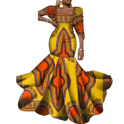 Luxury cotton African dress with intricate designs, ideal for formal occasions and celebrations.
