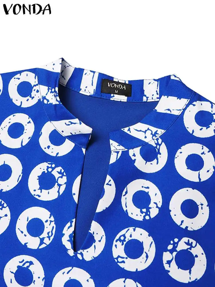 Luxurious plus size VONDA women's ensemble in dark pink, consisting of a striking polka dot top and matching pants, designed for contemporary elegance.