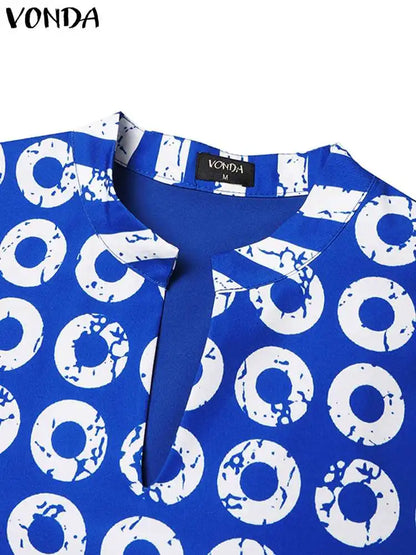 Luxurious plus size VONDA women's ensemble in dark pink, consisting of a striking polka dot top and matching pants, designed for contemporary elegance.