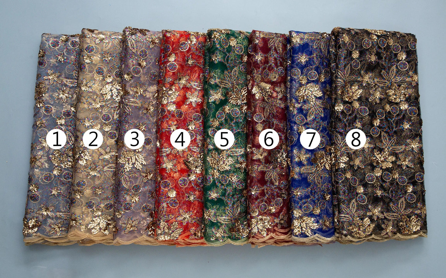 Elegantly crafted Kalume lace fabric in rich detail, perfect for creating stunning dresses for special occasions and celebrations.