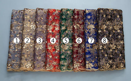 Elegantly crafted Kalume lace fabric in rich detail, perfect for creating stunning dresses for special occasions and celebrations.