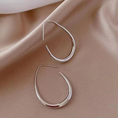 Classic water drop shape metal earrings for women, showcasing a luxurious design ideal for special occasions and stylish events.