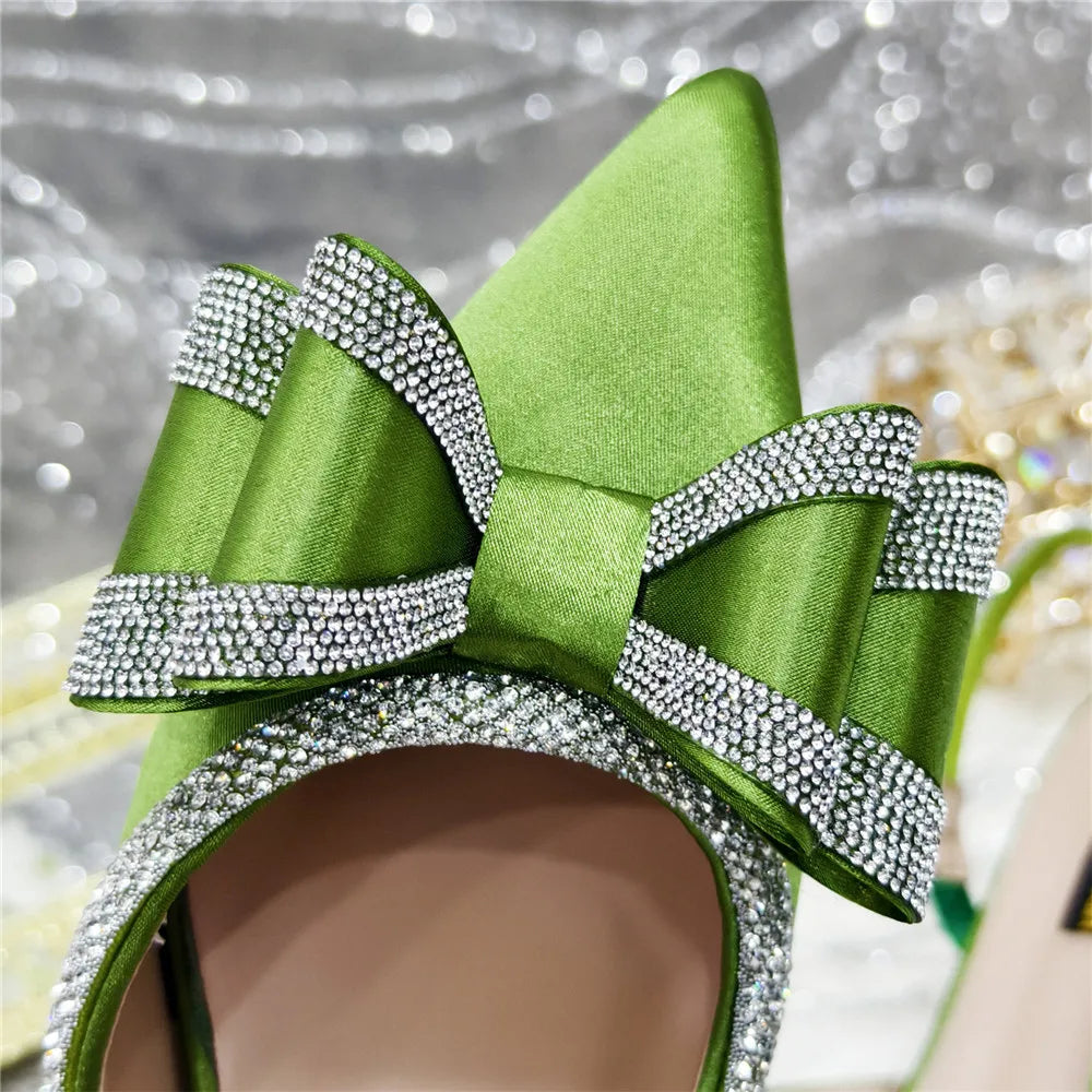 Elegant African party sandals displaying their bold and fashionable design, complete with high heels and intricate crystal embellishments.