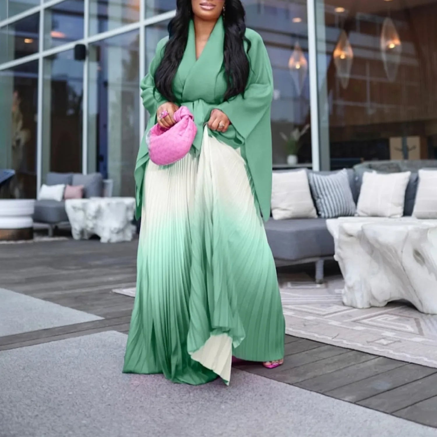 Elegant full sleeve V-neck blouse paired with a matching pleated long skirt, featuring a stylish belt for a flattering silhouette.