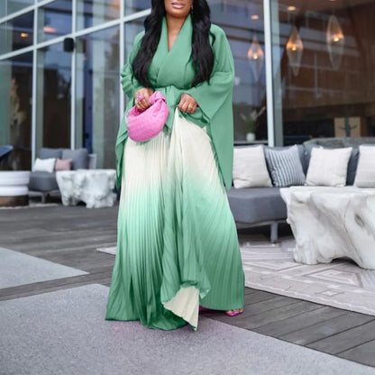 Elegant full sleeve V-neck blouse paired with a matching pleated long skirt, featuring a stylish belt for a flattering silhouette.