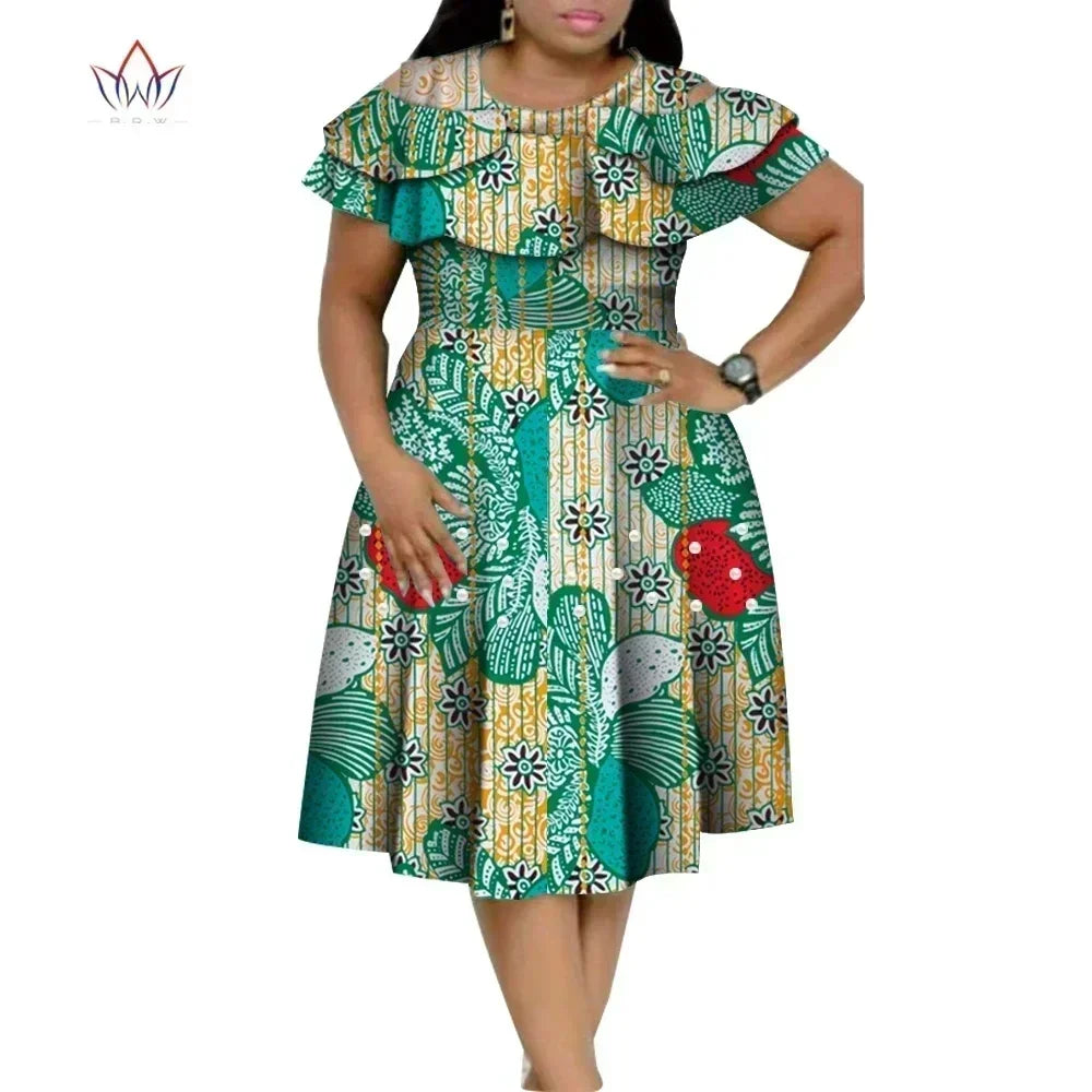 Model wearing an elegant Dashiki African print dress, embodying style and sophistication for evening events.