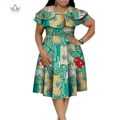 Model wearing an elegant Dashiki African print dress, embodying style and sophistication for evening events.