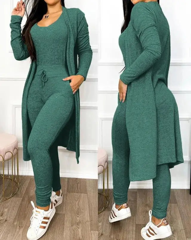 Elegant chic two-piece women's jumpsuit set featuring a sleeveless design complemented by a long sleeve coat, ideal for high fashion styling.