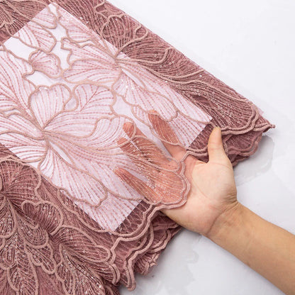 Luxurious African Milk Silk Mesh Lace Fabric with Sequins, perfect for elegant Nigerian wedding dresses, showcasing intricate embroidery and tulle design.