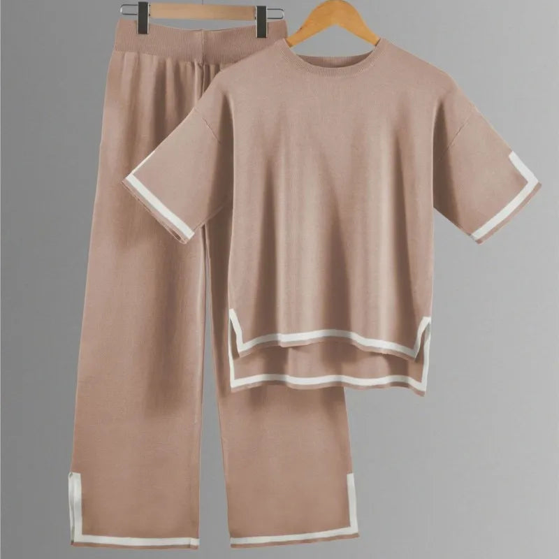 Elegant short-sleeved pullover from the women's knitted trousers suit, crafted with an O-neck collar for a refined look, perfect for spring and summer style.