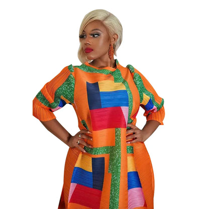 Elegant African Plus Size O-Neck Pleated Long Dress featuring 3/4 sleeves, designed with vibrant traditional Dashiki patterns for women.