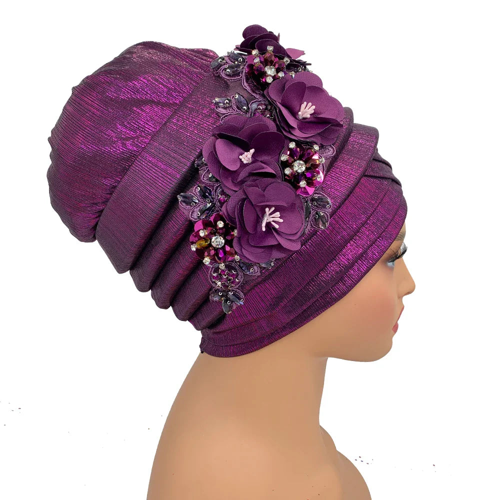 Luxurious African women's turban cap adorned with diamond flower, perfect for elegant occasions.