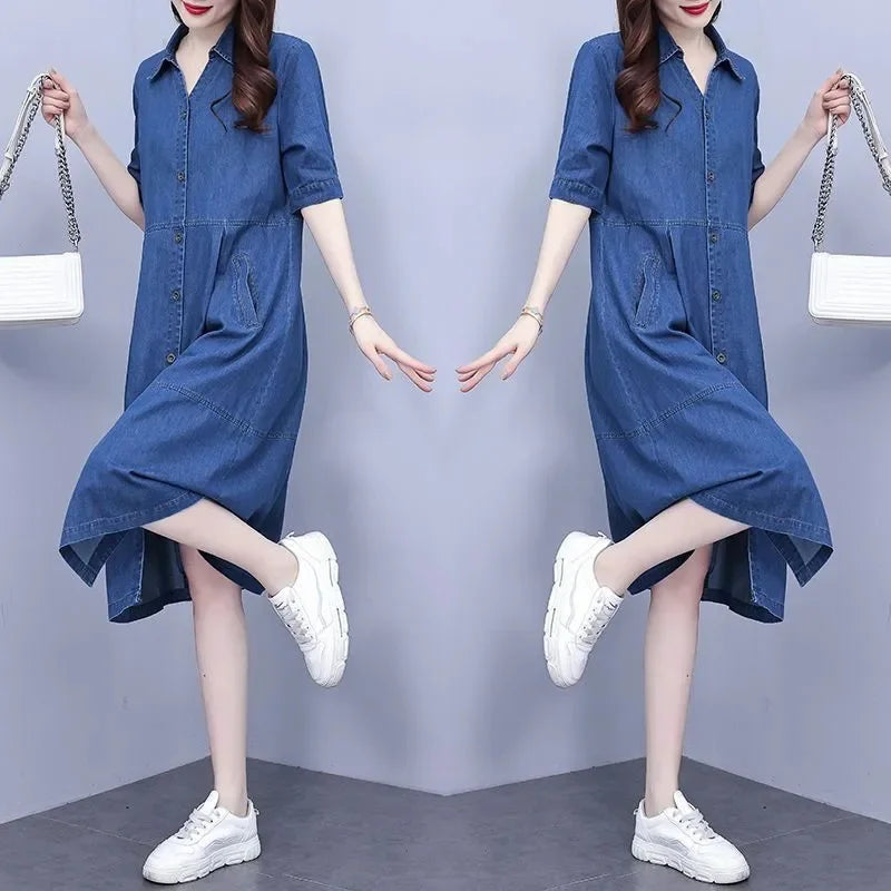 Close-up of the exquisite fabric detailing on the oversized 5XL casual short sleeve denim dress, highlighting its cotton blend material and functional pockets for enhanced luxury style.